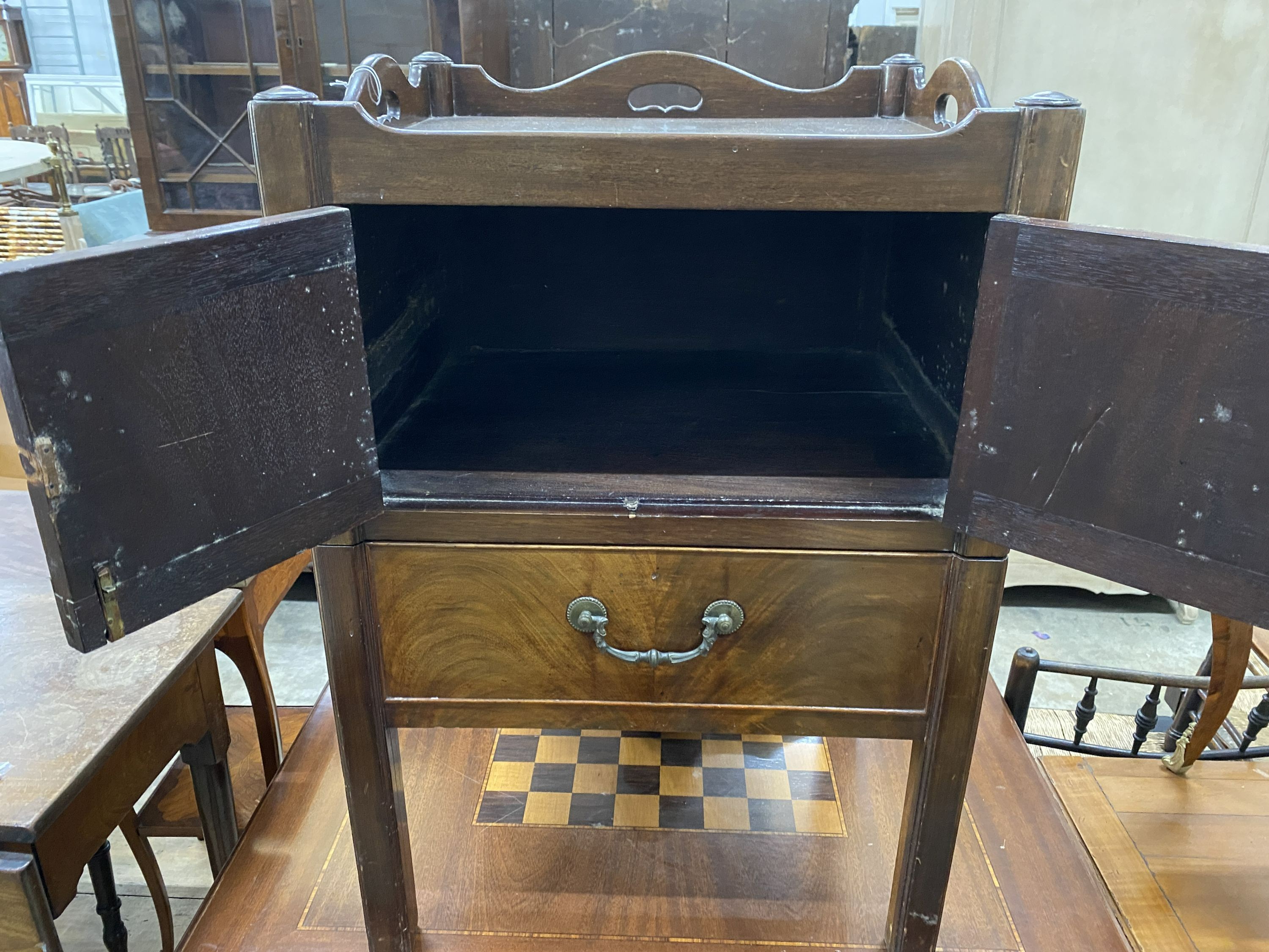 A George III mahogany tray topped bedside cupboard, width 52cm, depth 47cm, height 79cm